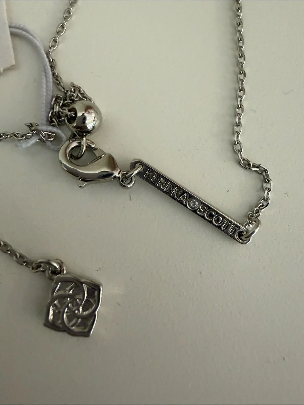 Kendra Scott Silver Necklace with Pale Pink Teardrop Pendant